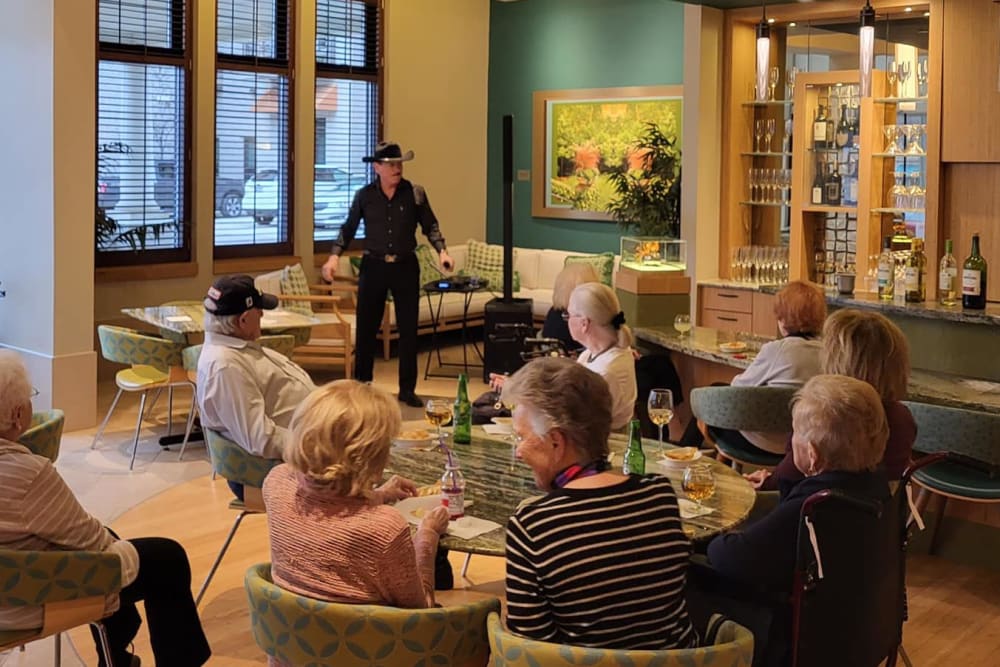 Residents having wine at All Seasons Birmingham in Birmingham, Michigan