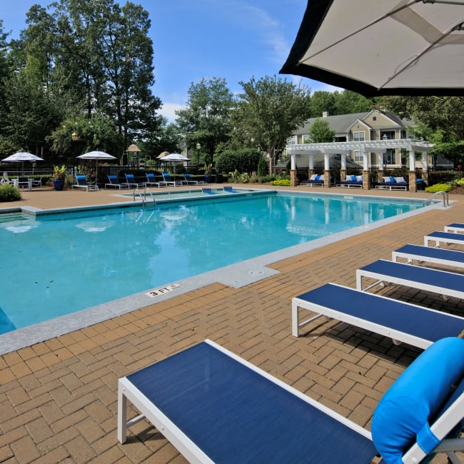 Beautiful sophisticated swimming pool and lounge area at Cavalier @ 100 in Lithonia, Georgia