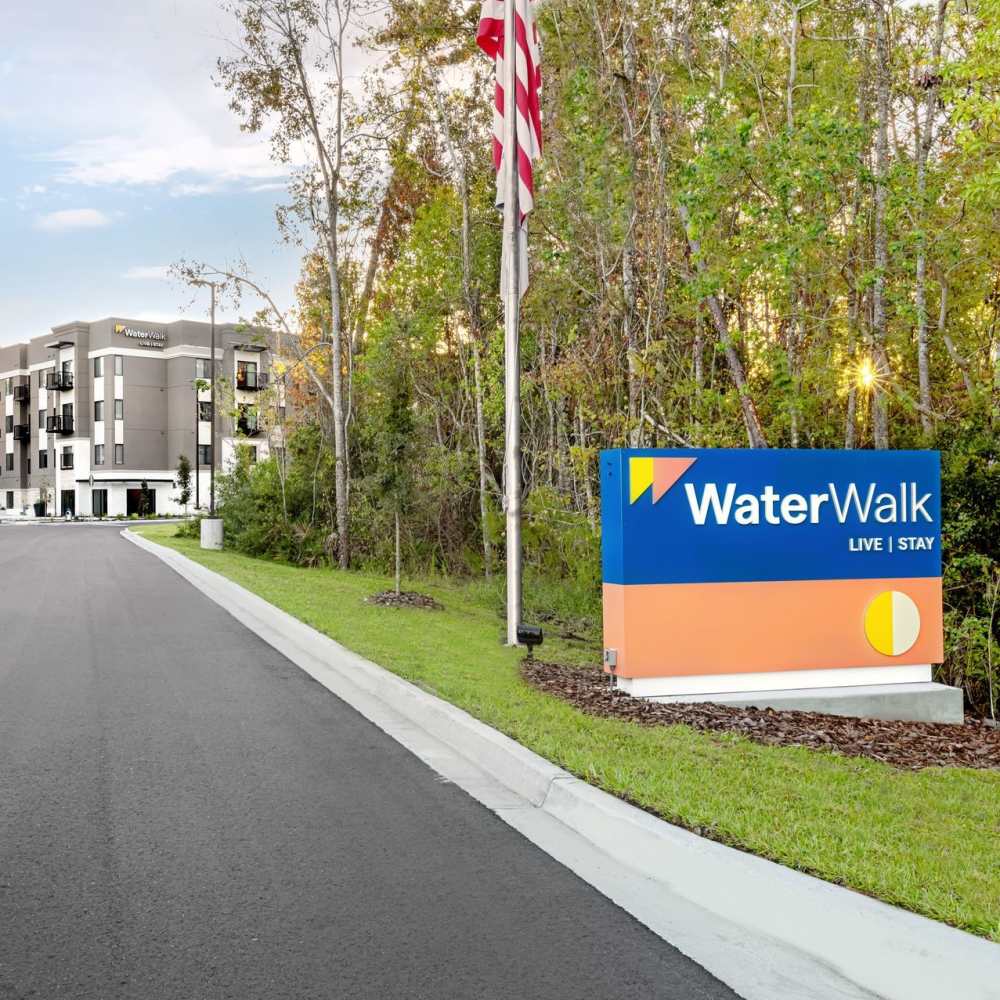 Apartment community entrance sign near WaterWalk Jacksonville - Deerwood Park in Jacksonville, Florida