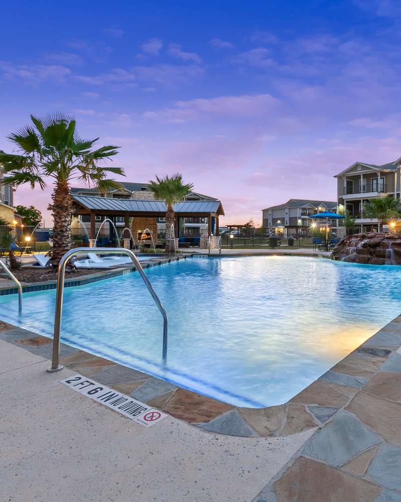Swimming pool with sunset view at Canyon House in New Braunfels, Texas
