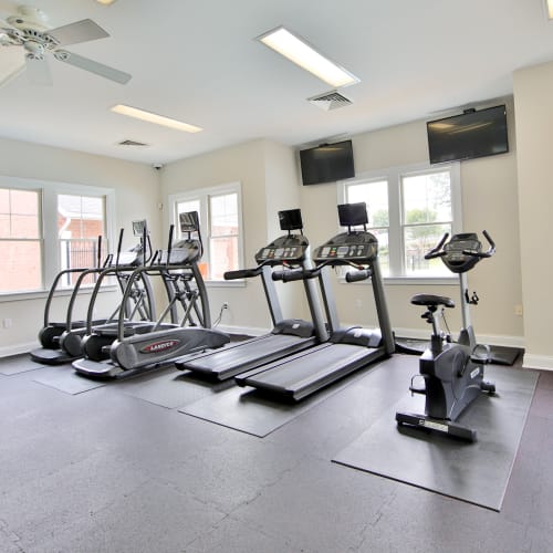 Cardio machines and weights in the high-tech fitness center at Silver Spring Station Apartment Homes in Baltimore, Maryland