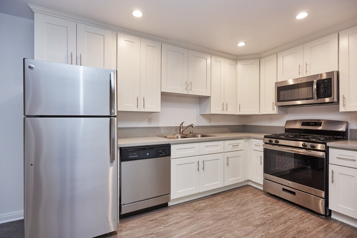 Kitchen with stainless-steel appliances at Ariel Court, Los Angeles, California 