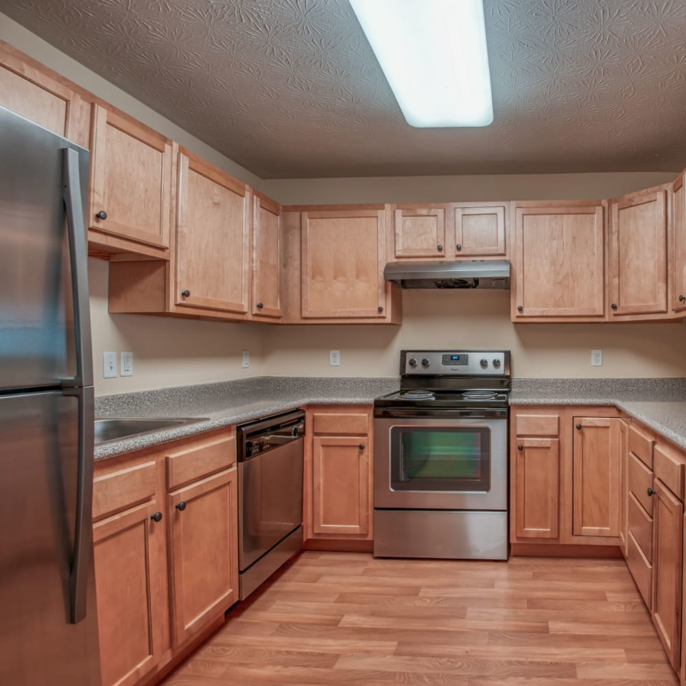 Kitchen with wood-style flooring at Chatham Commons, Cranberry Township, Pennsylvania