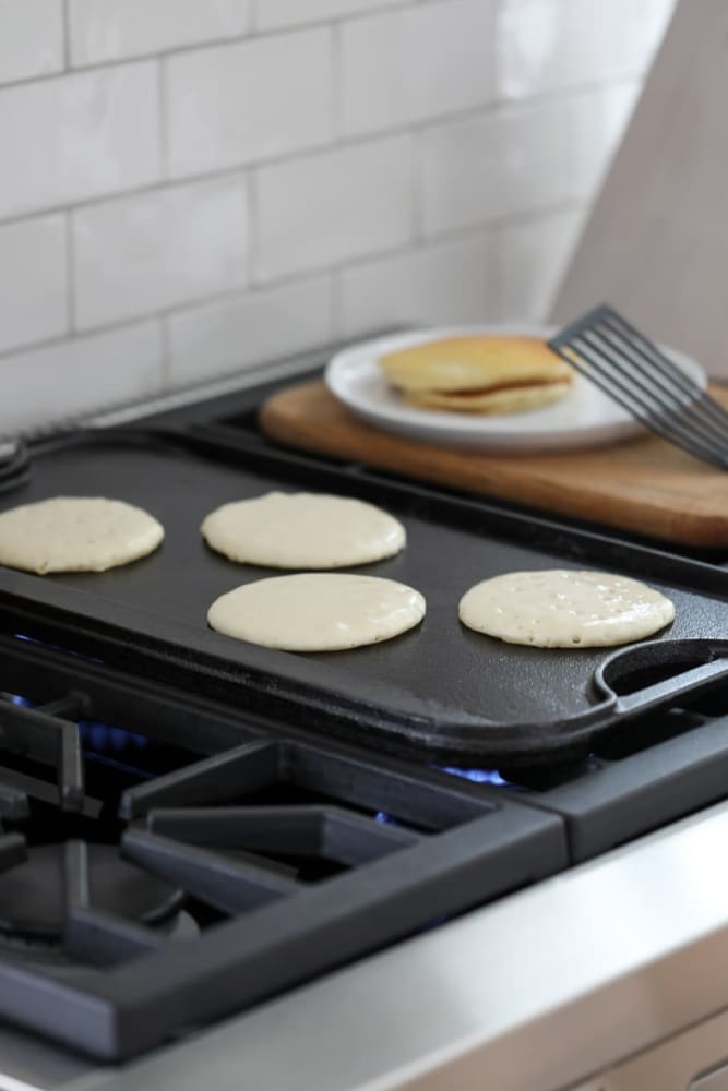 Pancakes cooking on a flat top at Solana Stapleton Apartments in Denver, Colorado