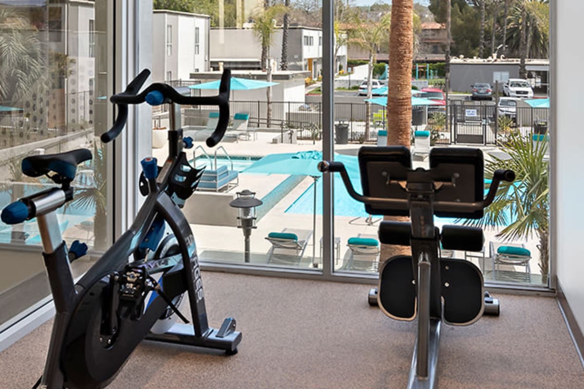 Fitness center overlooking pool at The Retreat at Thousand Oaks, Thousand Oaks, California