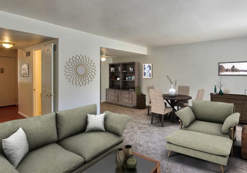 Spacious living room at Elmwood Terrace Apartments & Townhomes in Rochester, New York