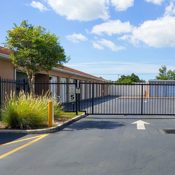 Gated access to outdoor storage units at StorQuest Self Storage in Sarasota, Florida