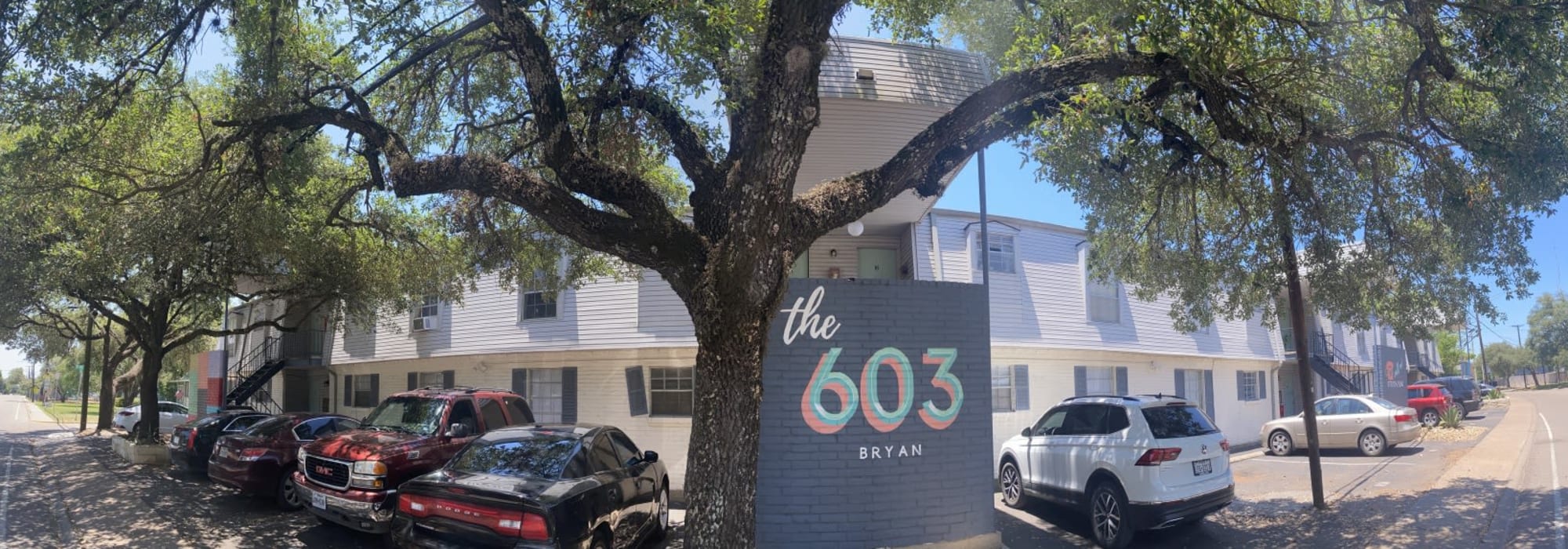 Parking and community sign at The 603 in Bryan, Texas