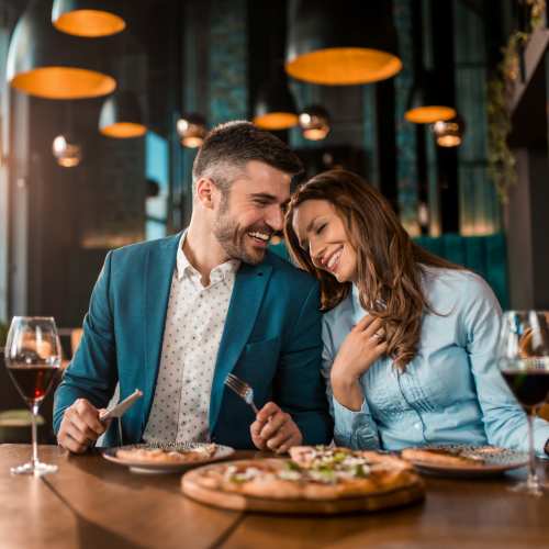 Resident couple having lunch at a restaurant near Valley Park Apartments in West Valley City, Utah