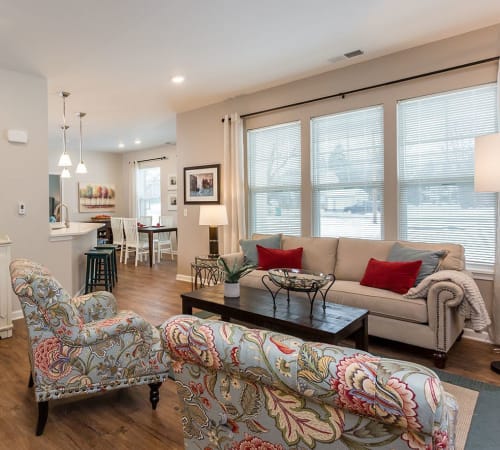 Elegant living room at The Marquis at the Woods in Webster, New York