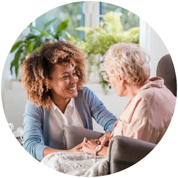 Resident being comforted by a caretaker at a Ebenezer Senior Living community