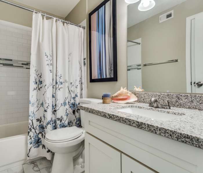 Bathroom with polished countertop at Clear Creek Landing in Houston, Texas