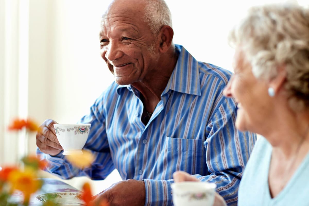 Two residents enjoying tea at The Oxford Grand Assisted Living & Memory Care in Kansas City, Missouri