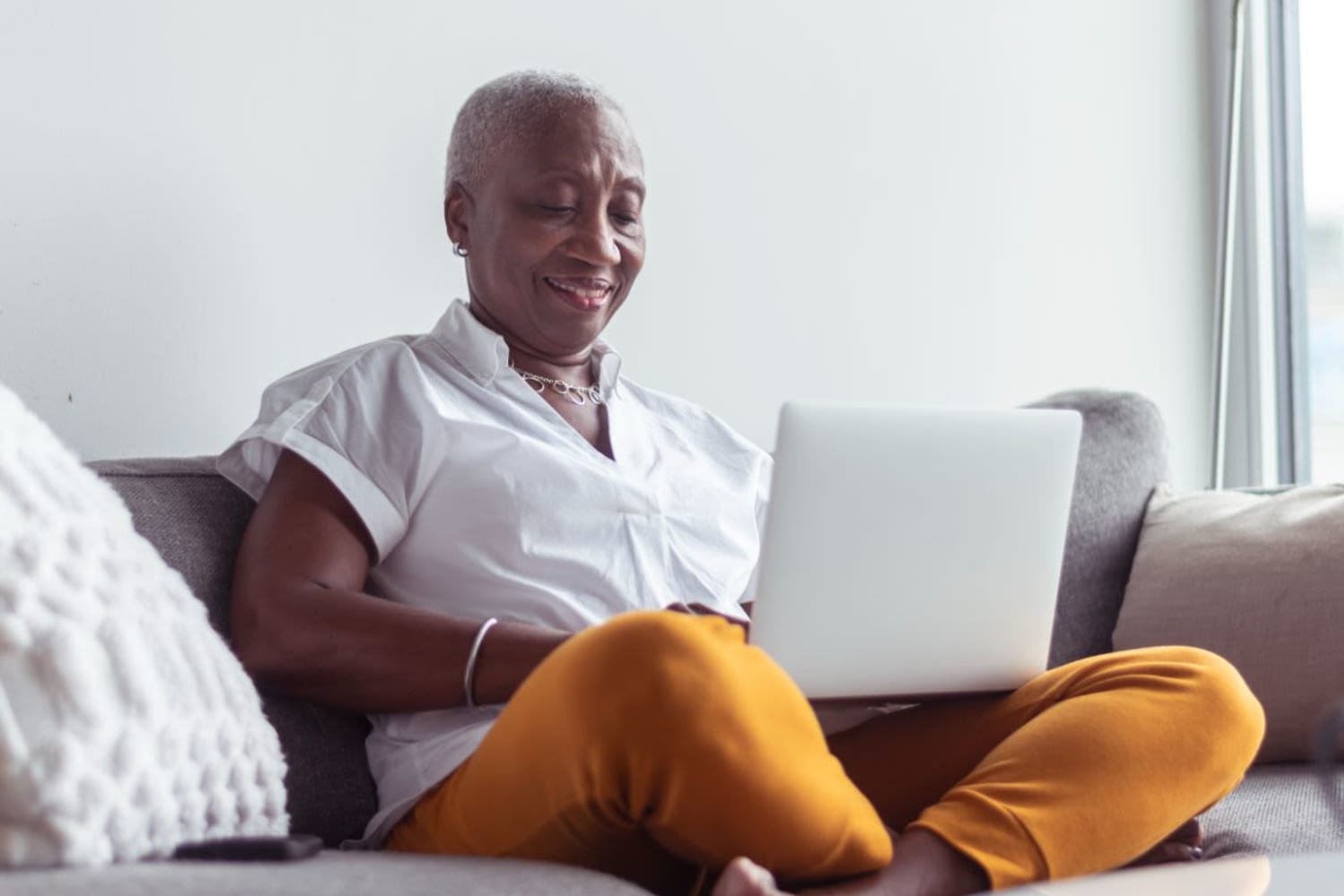 Resident using the online portal at Sunny Garden Apartments in La Puente, California