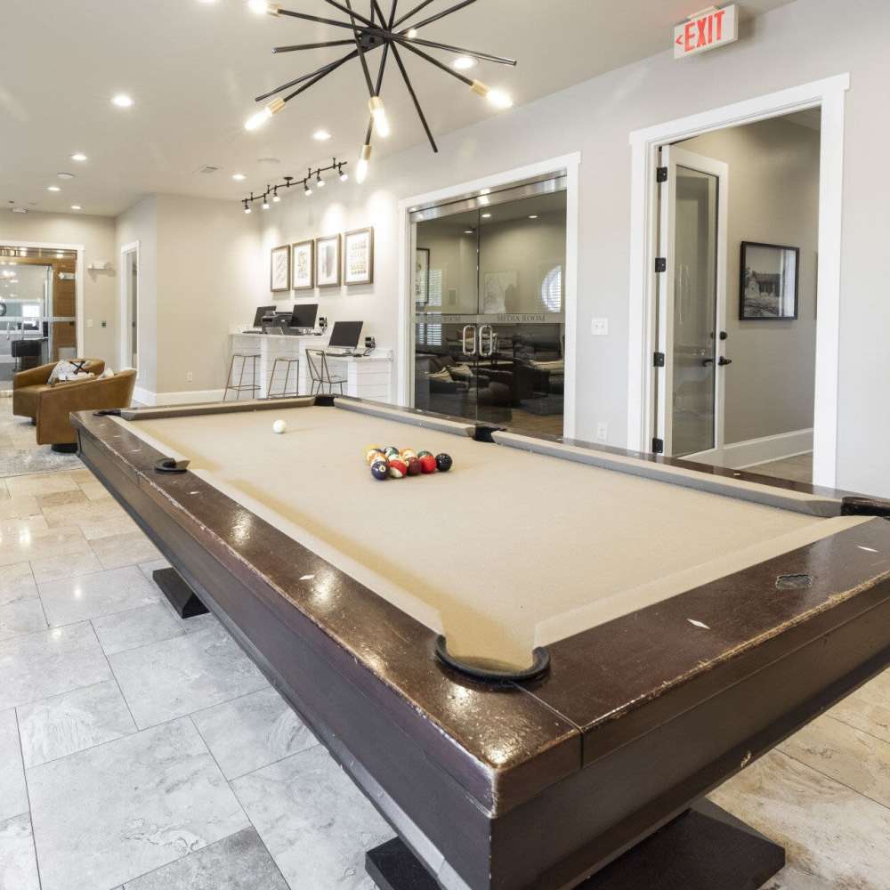 Clubhouse with pool table at Preserve At Columbus Park in Columbus, Georgia