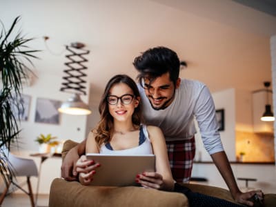 Resident couple looking at all the dining possibilities near The BLVD in San Angelo, Texas