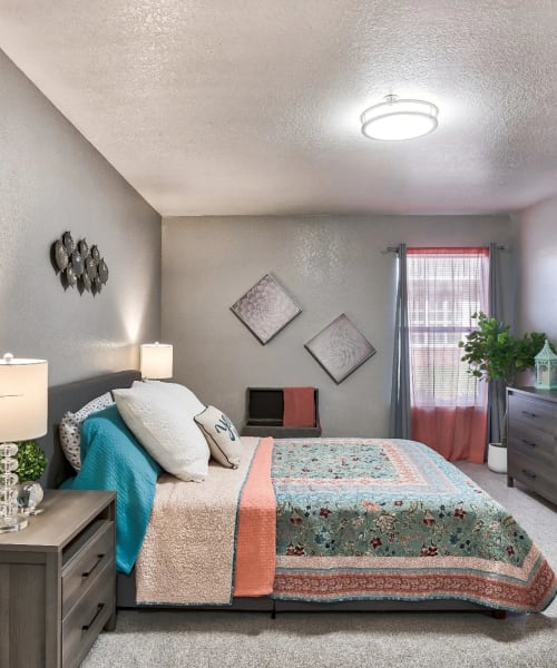Beautiful furnished bedroom in a model apartment at Reserve at Stillwater in Durham, North Carolina