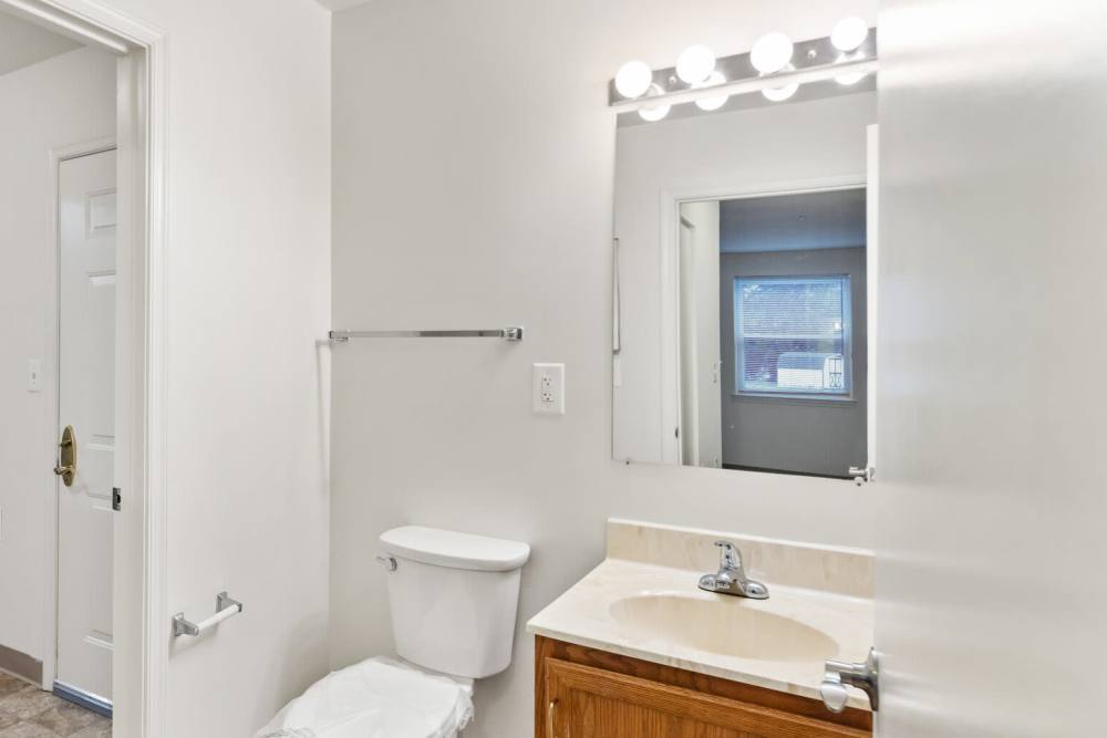 Bathroom with vanity setup at Randolph Village Senior Apartments in Silver Spring Maryland