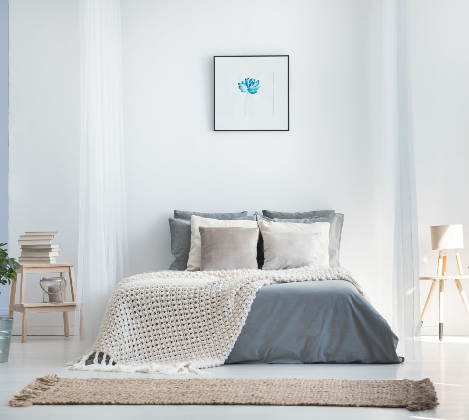 Eclectic decor in the bedroom of a model home at Sofi Ventura in Ventura, California