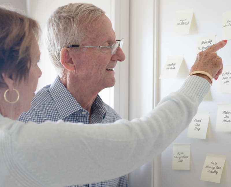 A resident couple working on memory recognition activities at Arbor Glen Senior Living in Lake Elmo, Minnesota