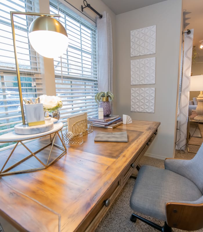 Work station with elegant lighting at Cascata Apartments in Tulsa, Oklahoma