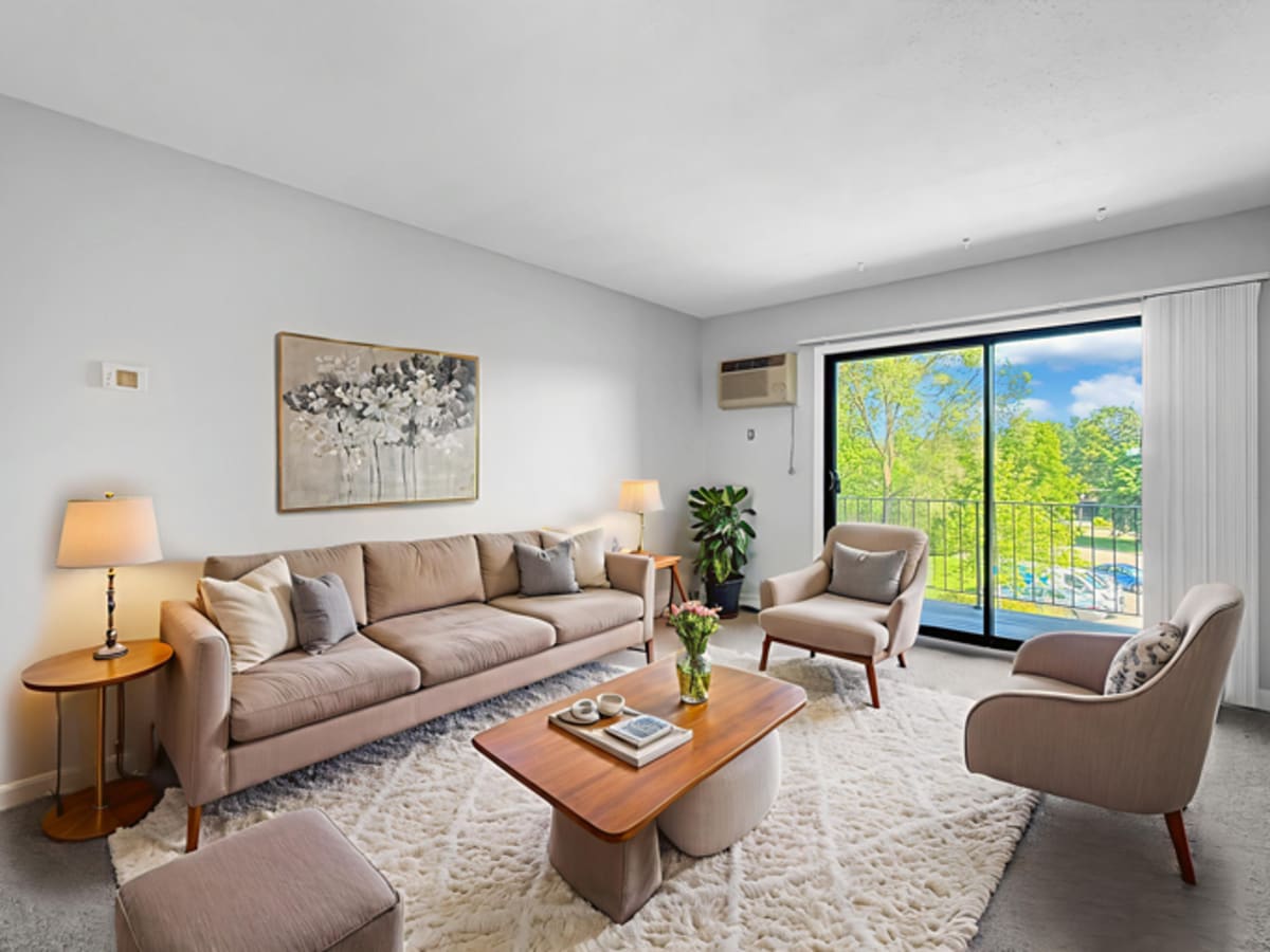 Spacious living room at Equinox Apartments in Saint Anthony, Minnesota
