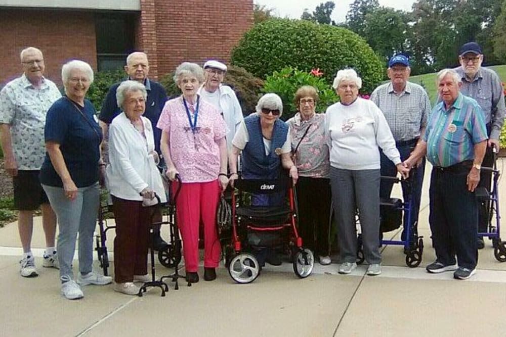 A group of cheerful residents at Garden Place Waterloo in Waterloo, Illinois. 