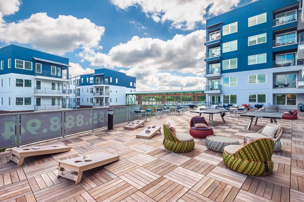 Outdoor lounge with games and Beltline views at EDGE on the Beltline in Atlanta, Georgia