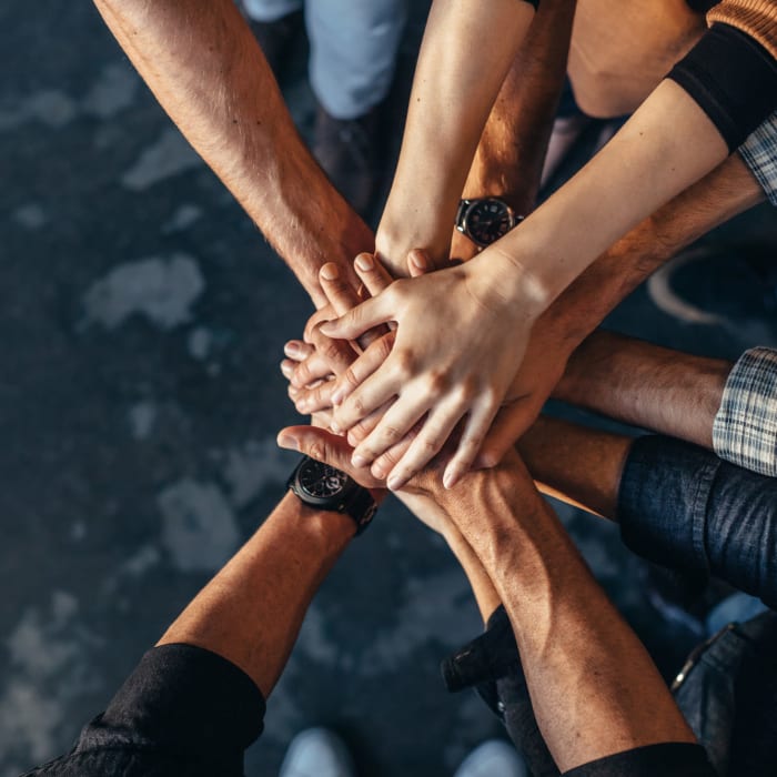 Hands huddle at The Club at Bartow in Bartow, Florida