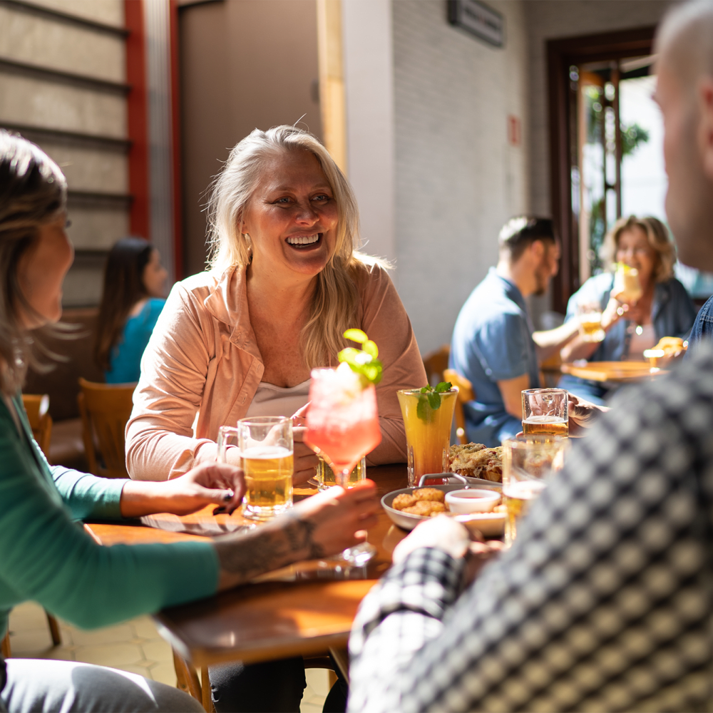 Residents at a restaurant near Verso Luxury Apartments in Davenport, Florida