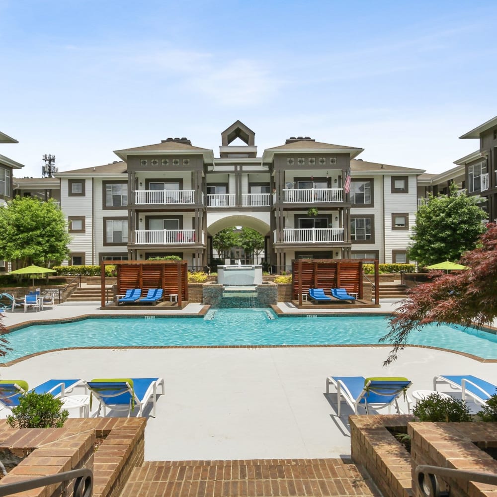 Refreshing swimming pool right next to the clubhouse at 45Eighty Dunwoody Apartment Homes in Dunwoody, Georgia