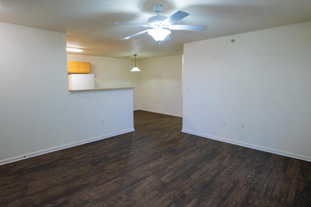 Living room with view to kitchen at Jacksonville Pines in Jacksonville, Texas