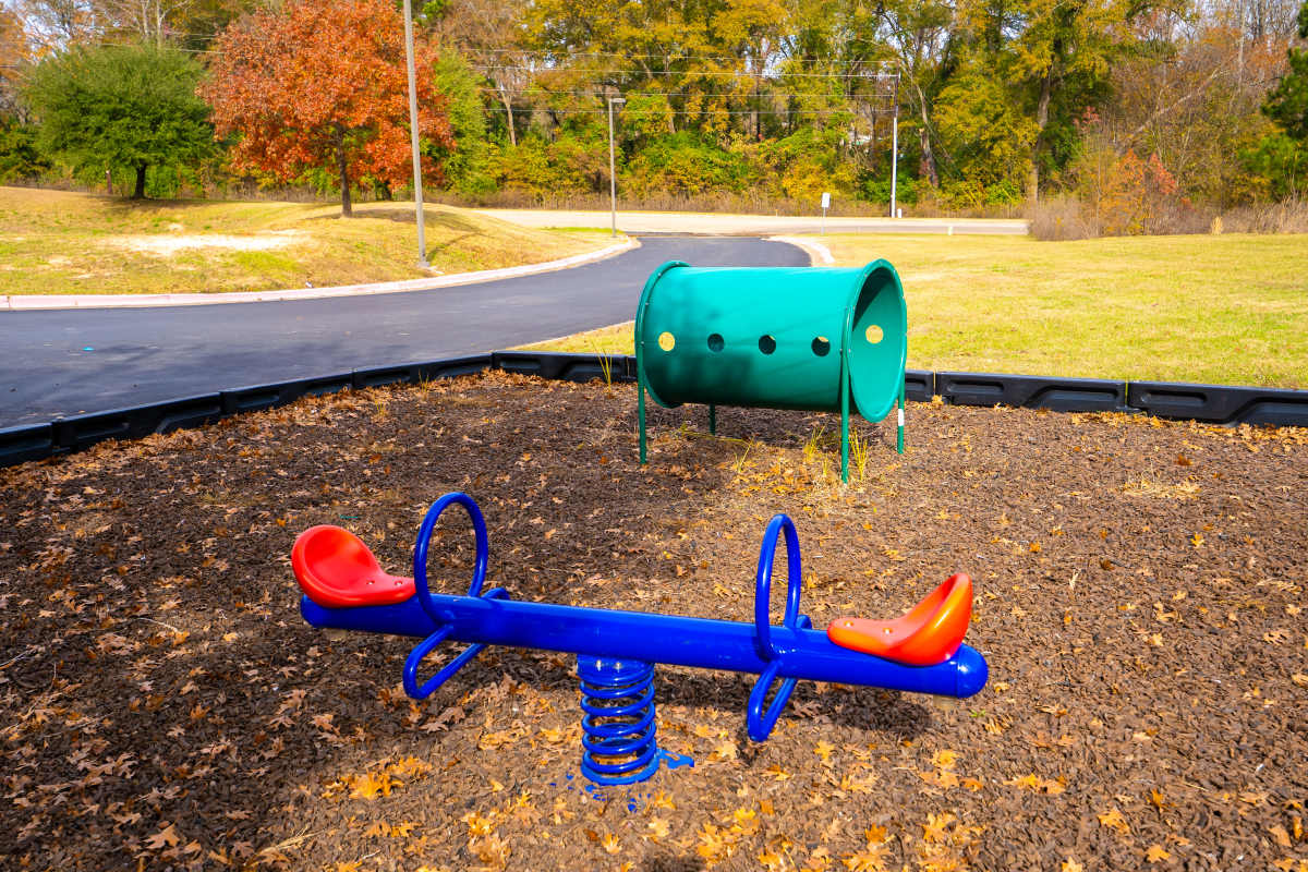 Tot lot at Jacksonville Pines in Jacksonville, Texas