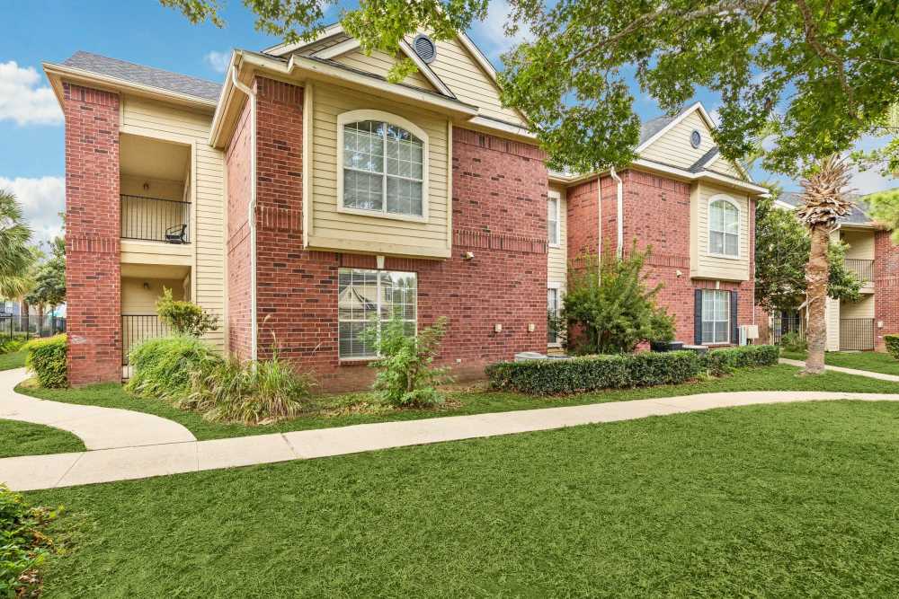 Community surrounded by the greenery at Brazoswood Apartments in Clute, Texas