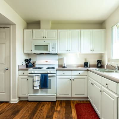 White cabinets in a kitchen at Serra Mesa in Oceanside, California