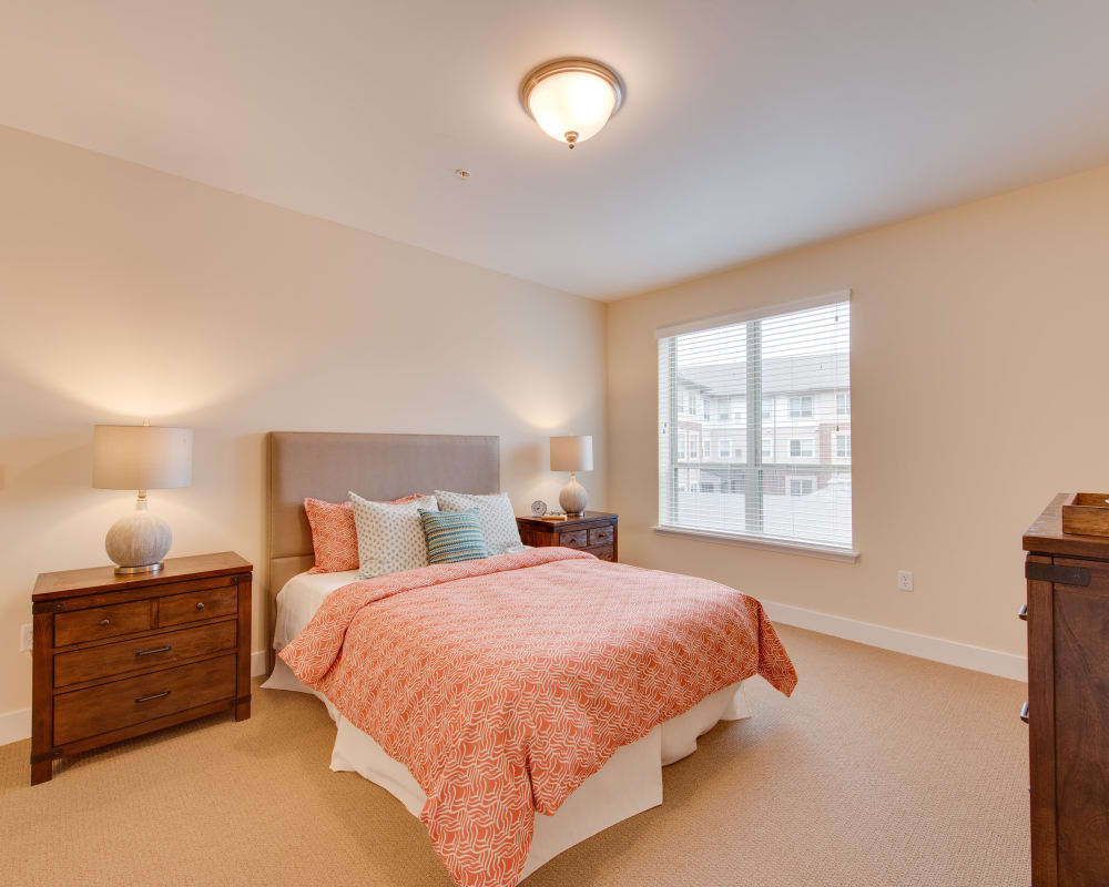 A decorated bedroom at Harmony at Oakbrooke in Chesapeake, Virginia
