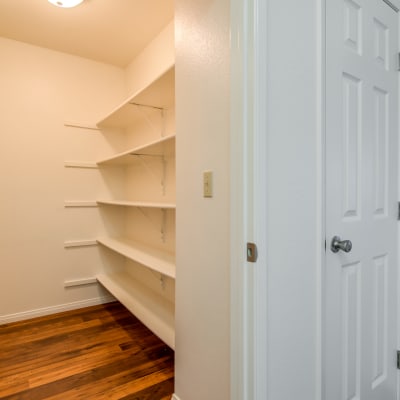 Looking into a storage closet with shelving at Del Mar I in Oceanside, California