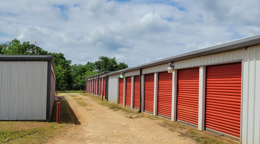 A parent playing with a child in a moving box near KO Storage in Gilmer, Texas