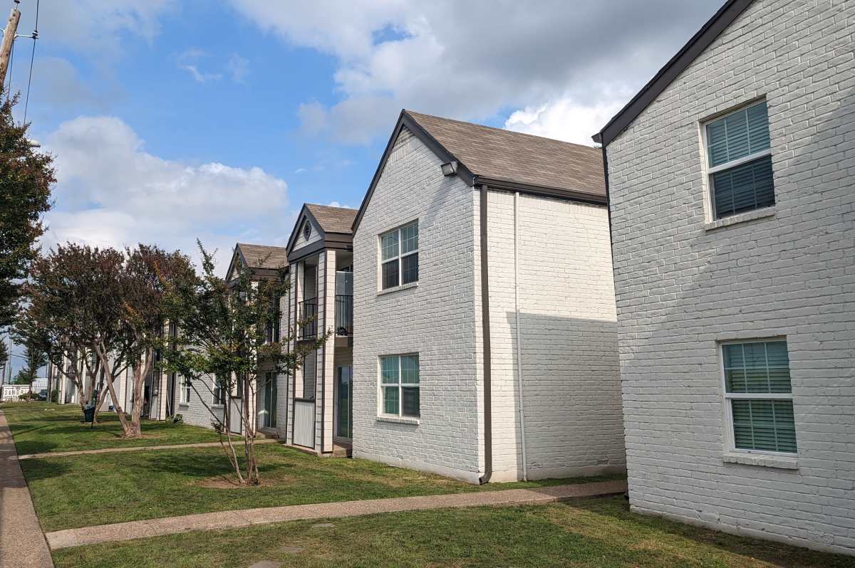 Charming properties with lush landscaping and modern architecture at Sangria Park in Austin, Texas.