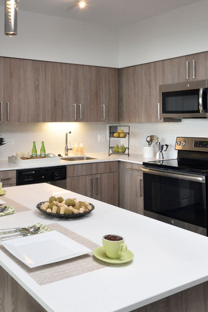 Spacious modern kitchen with a large island at Scio at the Medical District in Chicago, Illinois