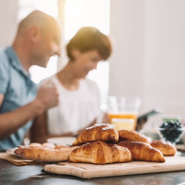 Residents enjoy breakfast pastries at Acclaim at Cary Pointe, Cary, North Carolina