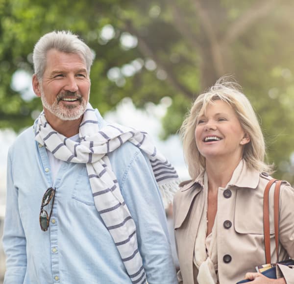 Couple enjoying a walk near Charlesgate Apartments in Towson, Maryland