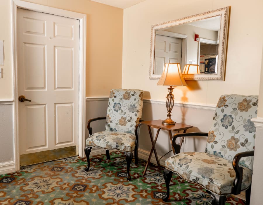 Nice cozy seating area outside residents door at The Club at Lake Wales in Lake Wales, Florida