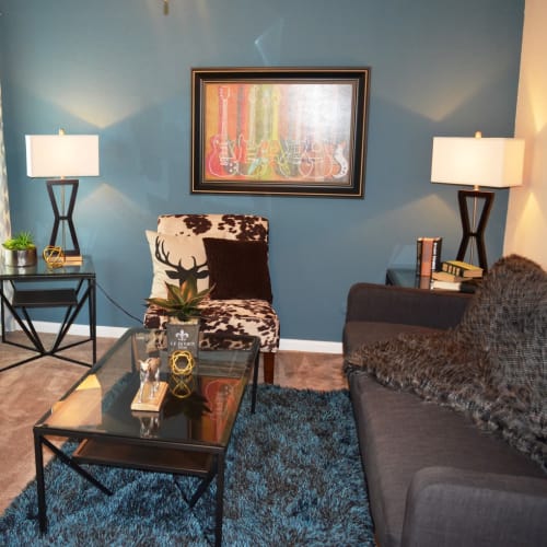 The Abbey at Memorial offers a cozy living room in Houston apartments