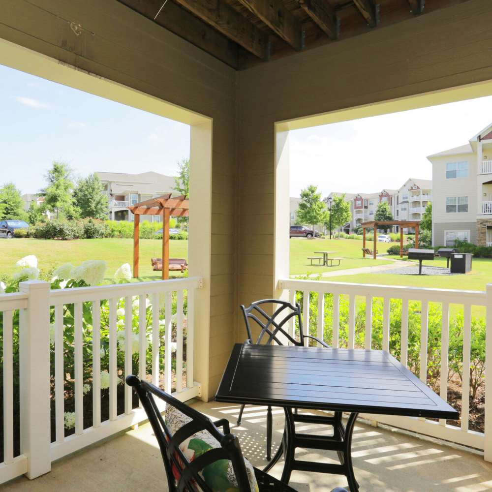 Private balcony with chairs and view of community at Preserve At Columbus Park in Columbus, Georgia
