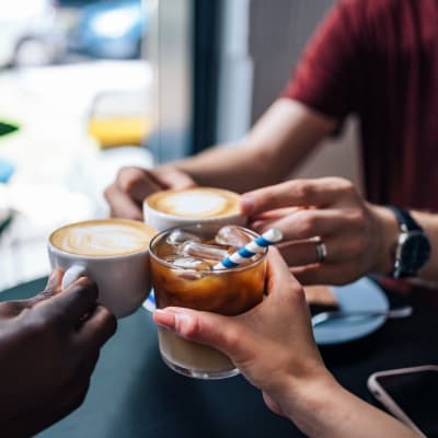Friends having coffee near James River Pointe in Richmond, Virginia