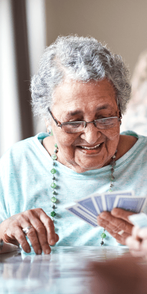 resident playing a game of cards at The Birches of Lehigh Valley in Easton, Pennsylvania