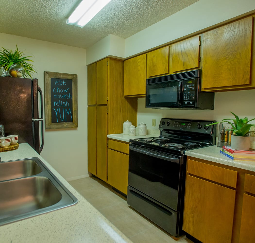 Well equipped kitchen at Cedar Glade Apartments in Tulsa, Oklahoma