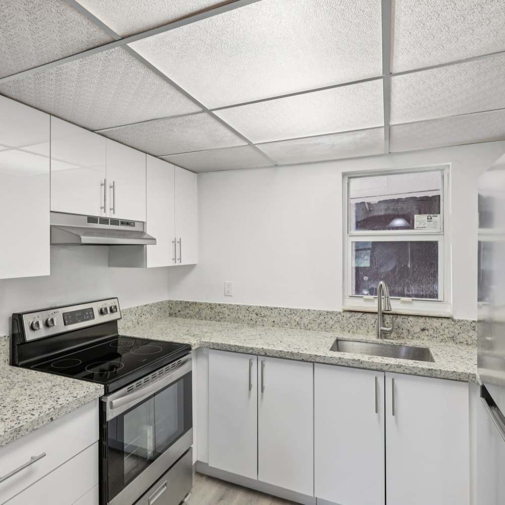 Energy-efficient appliances in kitchen at El Jardin Apartments in Hollywood, Florida