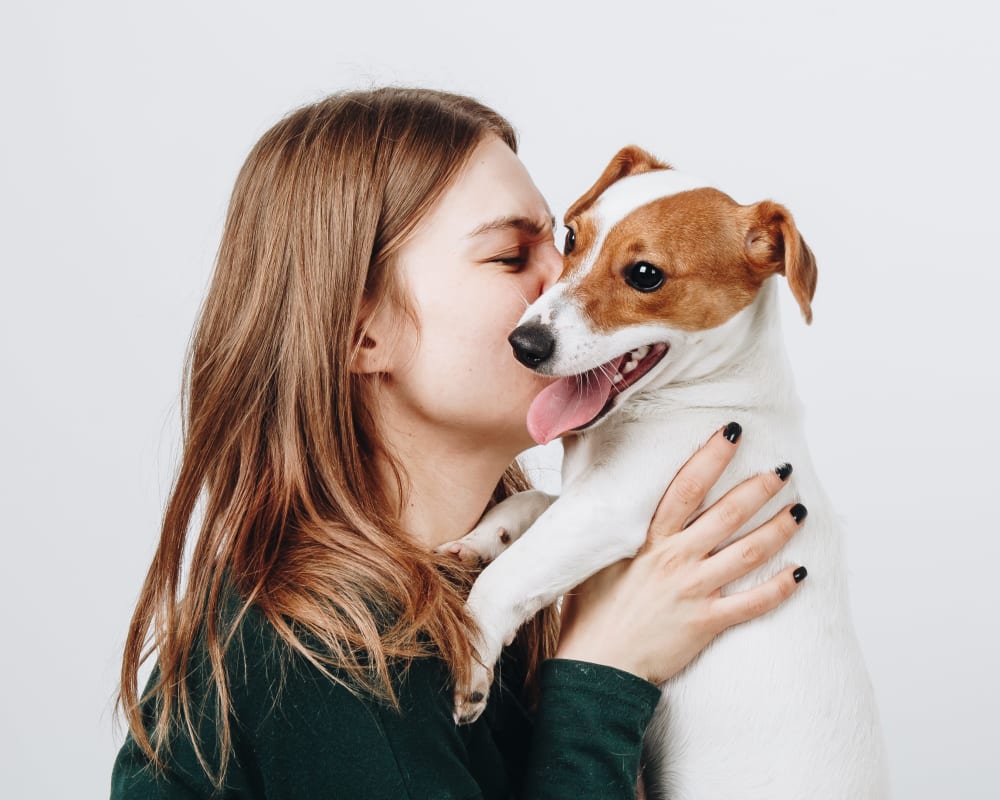 Resident and her puppy in their new home at Rocket Pointe in Durango, Colorado